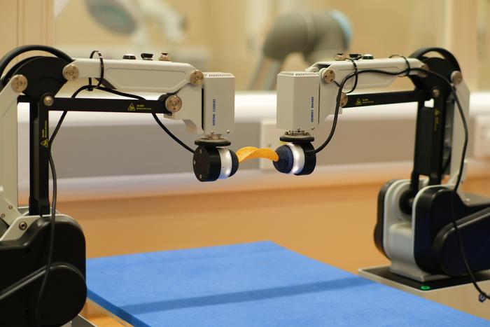 Dual-arm robot could recreate touch in artificial limbs